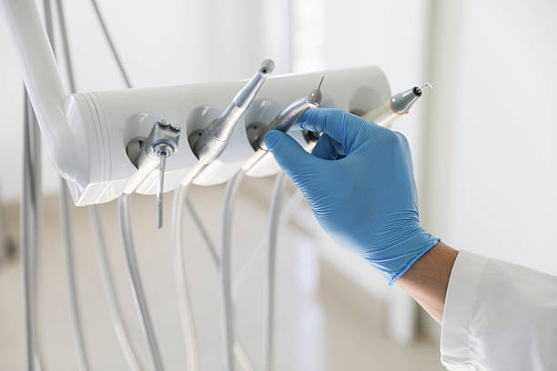 Professional Emergency Dentist technician working in Pelican Marsh, FL